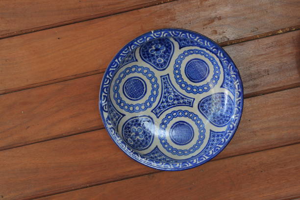istock Porcelain plate on a wooden table 815509568