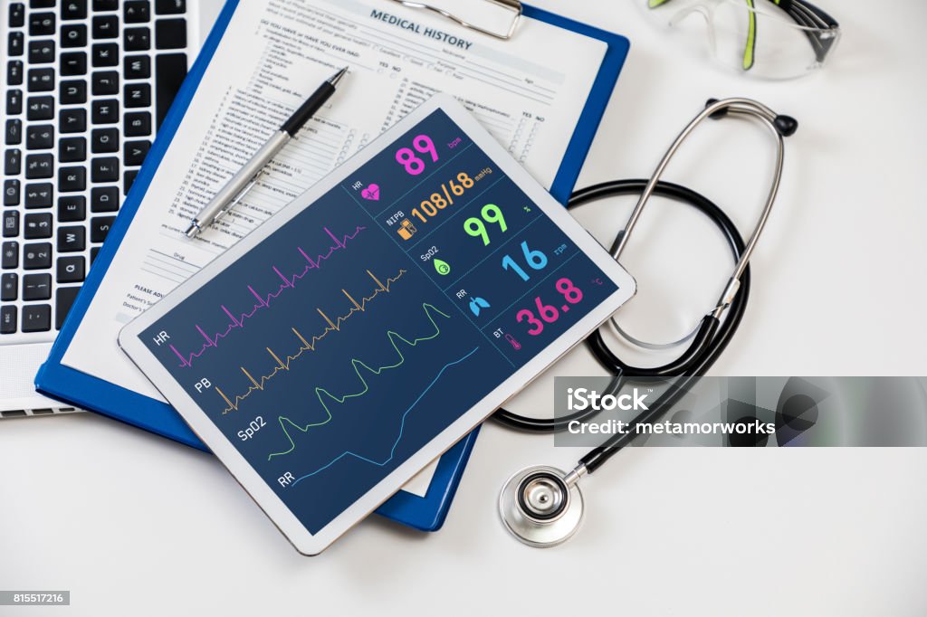 vital sign monitor in tablet PC, medical technology concept Healthcare And Medicine Stock Photo