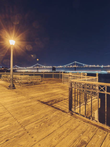 View Of Lights On Pier Seven Against Sky