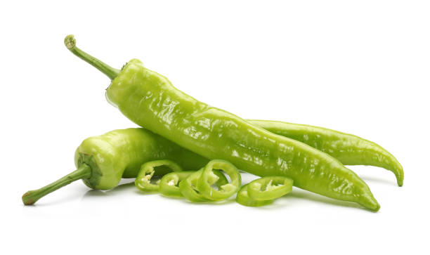 istock Green hot chili peppers isolated  on the white background 815525520