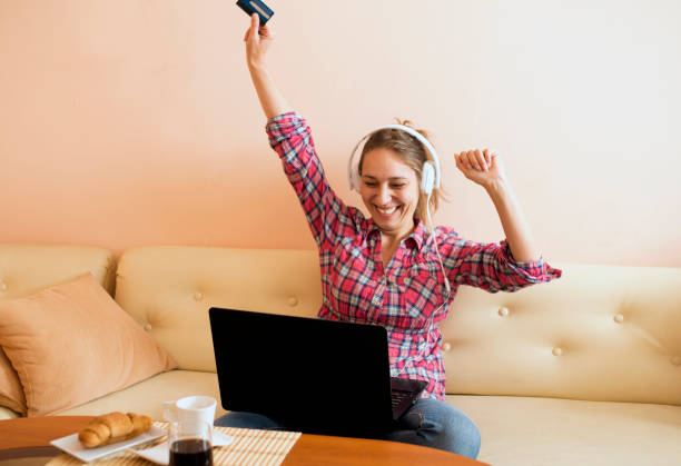 istock Euphoric and surprised winner winning online 815538630