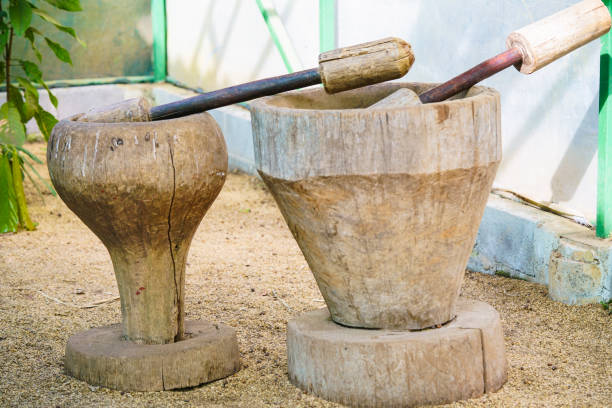 istock Traditional wooden crushing jar for coffee beans 815565848