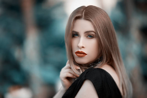Portrait of the girl in beautiful earrings