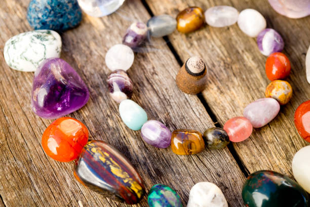 istock Incense cone burning in circles of healing crystals 815573698