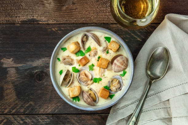 istock Bowl of clam chowder soup, overhead shot, with copy space 815579558