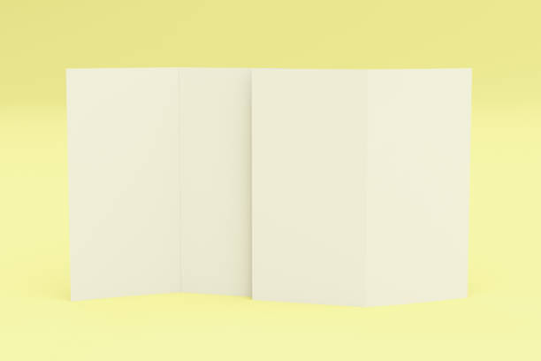 istock Blank white two fold brochure mockup on yellow background 815579618