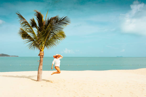 istock Woman at tropical beach 815588124