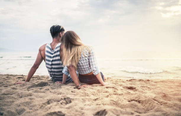 istock Happy couple date at the seaside at sunset 815591194