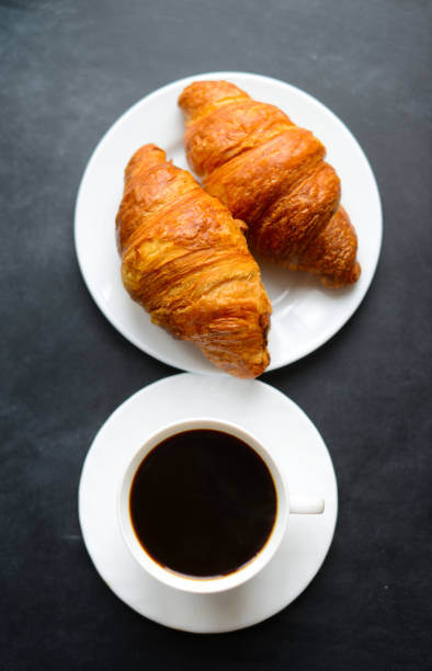 istock Fresh croissants and coffee 815594072