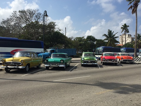 Old american cars parked in the street of Havana, Cuba