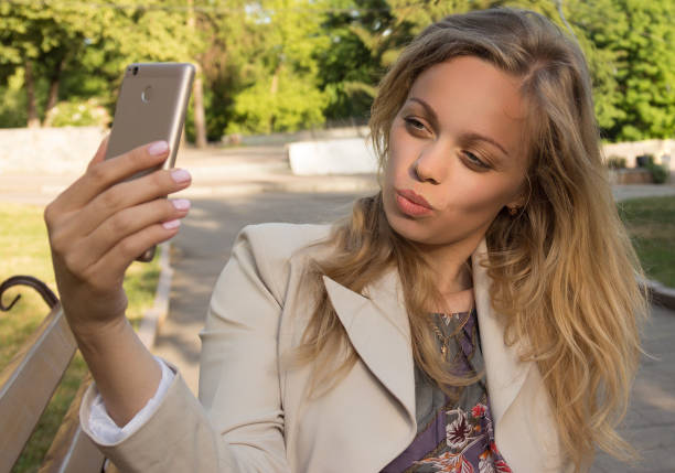 istock Joyful girl talking on the phone 815597530
