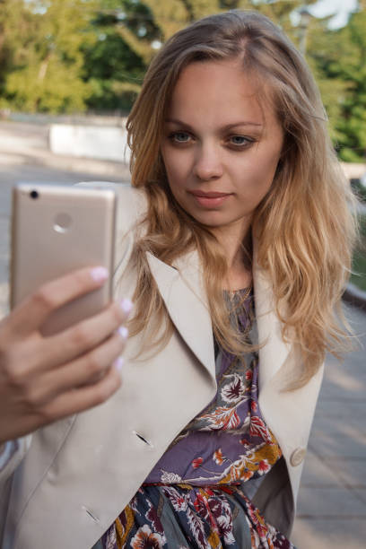 istock Joyful girl talking on the phone 815597542