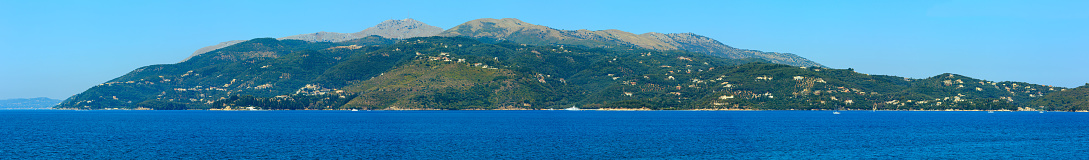 Summer view of Corfu island (Greece). Ionian sea coastline landscape. Six shots stitch high-resolution panorama.