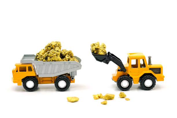 istock Dump truck and bulldozer Dealing with gold ore mine on white background 815612636