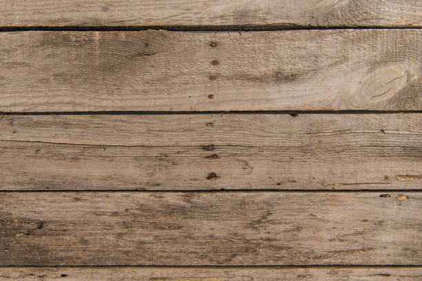 istock Top view of brown rustic wooden background with horizontal planks 815617306