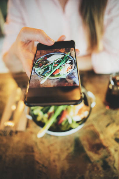 istock Taking a photo of food 815617348