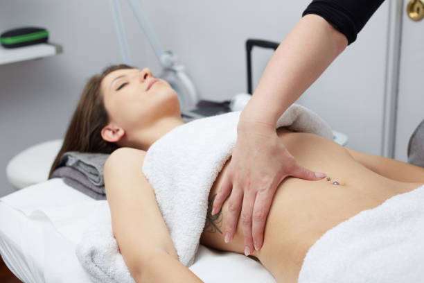 istock Beautiful woman having relaxing massage in spa salon 815620188
