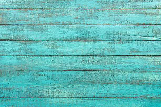 istock Top view of decorative rustic turquoise wooden background with horizontal planks 815620202