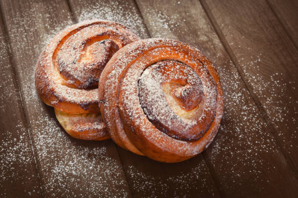 istock sweet buns on a wooden background 815624458
