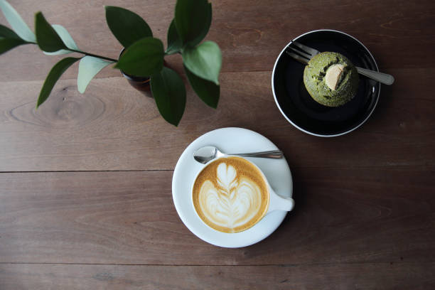 cappuccino coffee on wood background