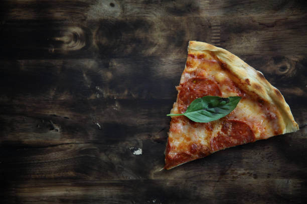 istock pepperoni pizza on wood background 815635452