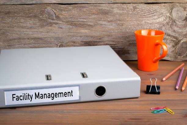 istock Facility Management. Folder, Coffee Mug, colored pencils on wood 815638854