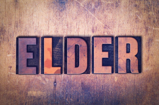 istock Elder Theme Letterpress Word on Wood Background 815643124