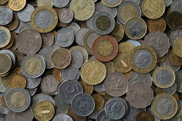 istock A pile of coins from different countries 815645394