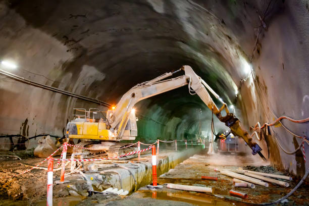 istock Hydraulic Hammer Excavator - Concrete Road Tunnel Construction 815649386