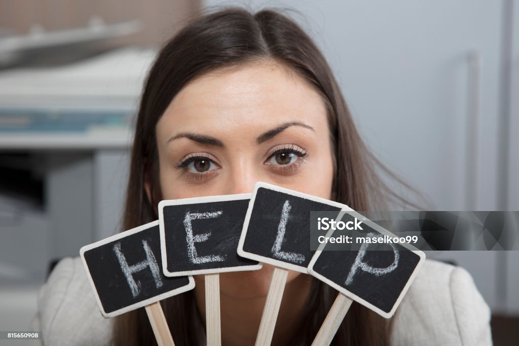 Business woman exposes her eyes for a sign Sadness Stock Photo