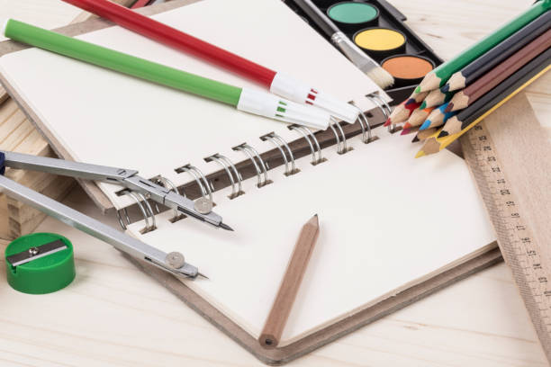 istock Back to school template with multiple stationery and book on table 815654434