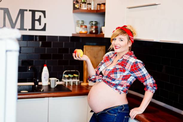 istock Beautiful pin up stylized young pregnant woman 815659544