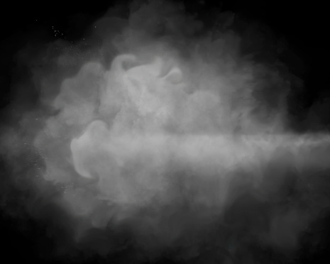 White smoke on black background with copy space.