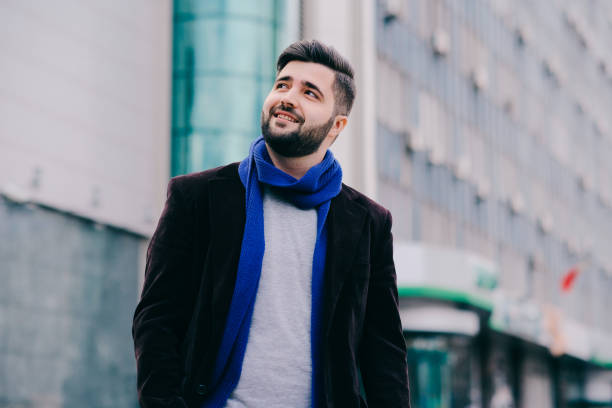 istock Handsome young man on a walk in town 815667380