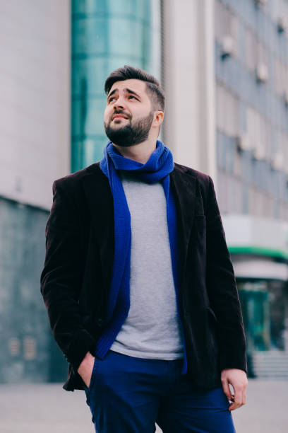 istock Handsome young man on a walk in town 815671652