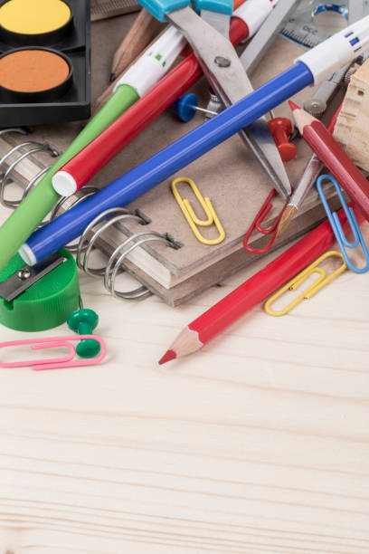 istock back to school template with multiple stationery on wooden table 815676890