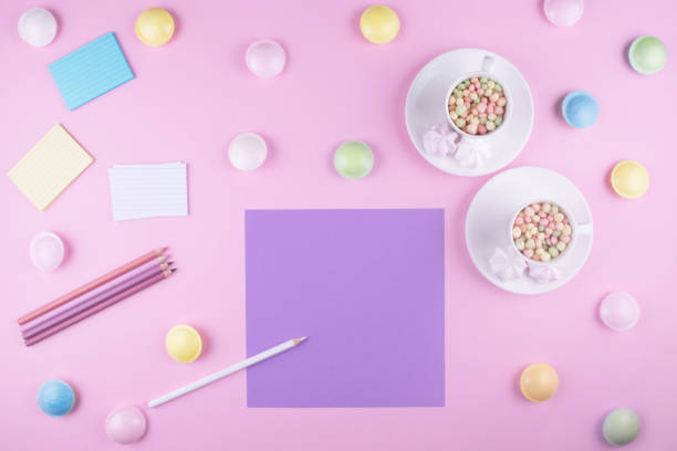 istock Workplace. Sheet of colored paper and pencils. 815678038