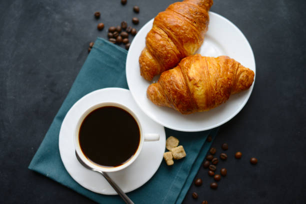 istock Fresh croissants and coffee 815680260