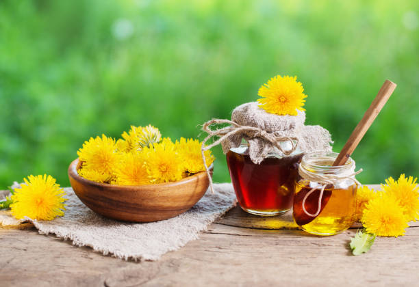 istock Jam from dandelions on a wooden table 815681144