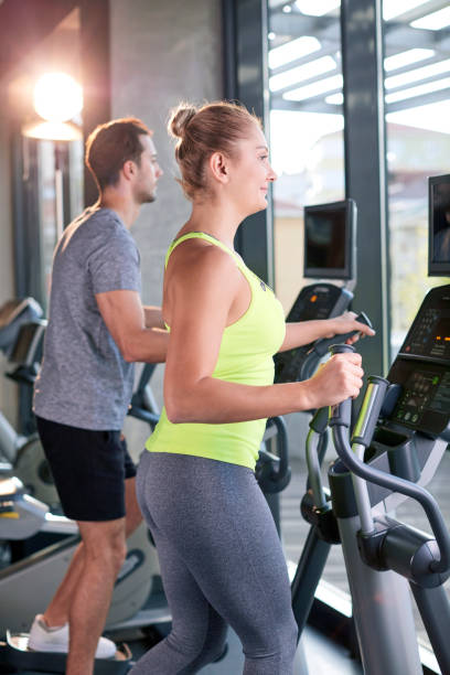 istock Healthy group of people working out on a elliptic trainer 815681394
