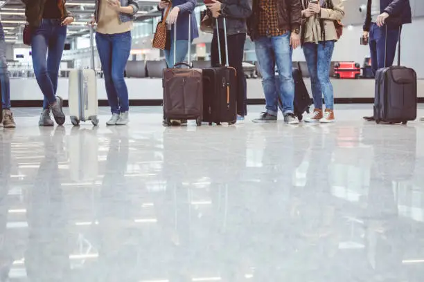 Photo of Passengers waiting at boarding gate at airport