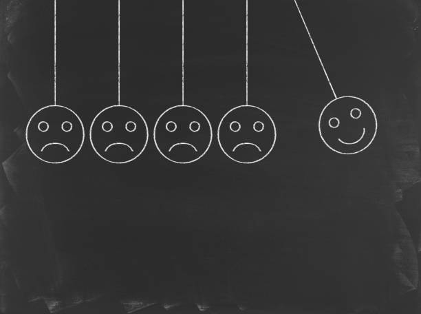istock Newton's Cradle & Happy Smiley - Business Chalkboard Background 815707558