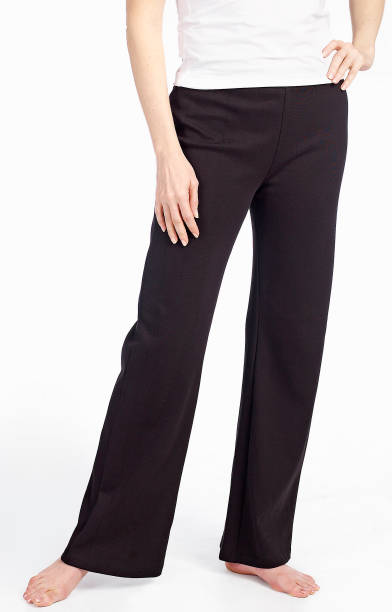 female wearing black yoga exercise pants