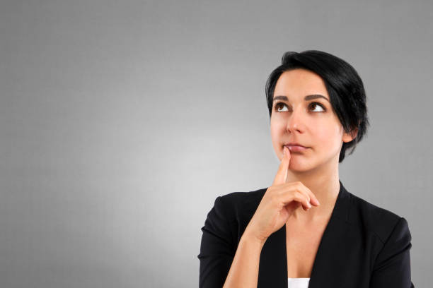 istock Young Businesswoman Thinking 815720184