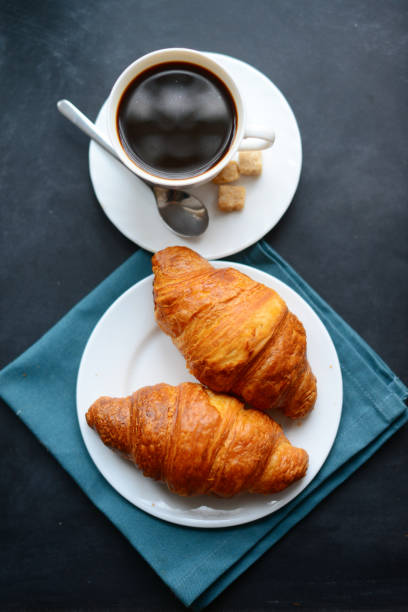 istock Fresh croissants and coffee 815734308