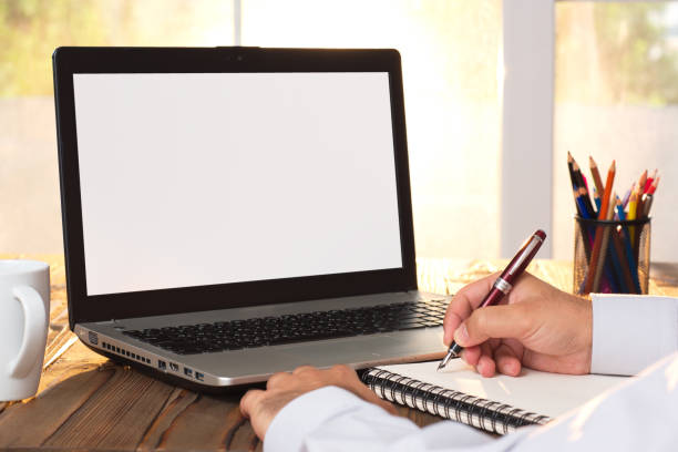 istock Laptop Computer Monitor With White Screen In Office 815737314