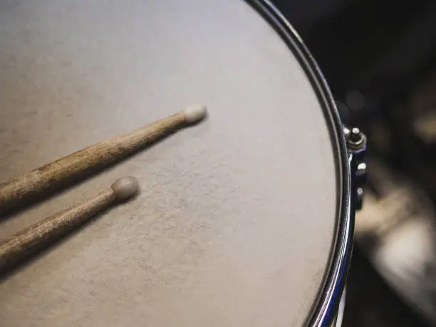 Photo of Drumsticks on a black background. Beautiful drumsticks