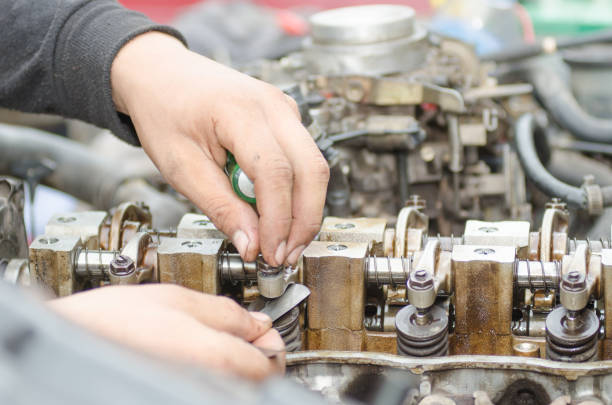 istock Machinists are tuning the valve repair machine. 815747758