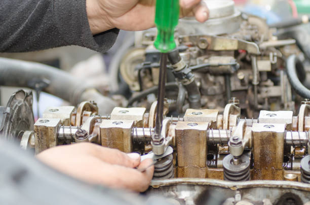 istock Machinists are tuning the valve repair machine. 815748112