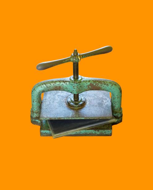 istock Old-Fashioned Green Ironing Tool Isolated On Orange Background 815748214